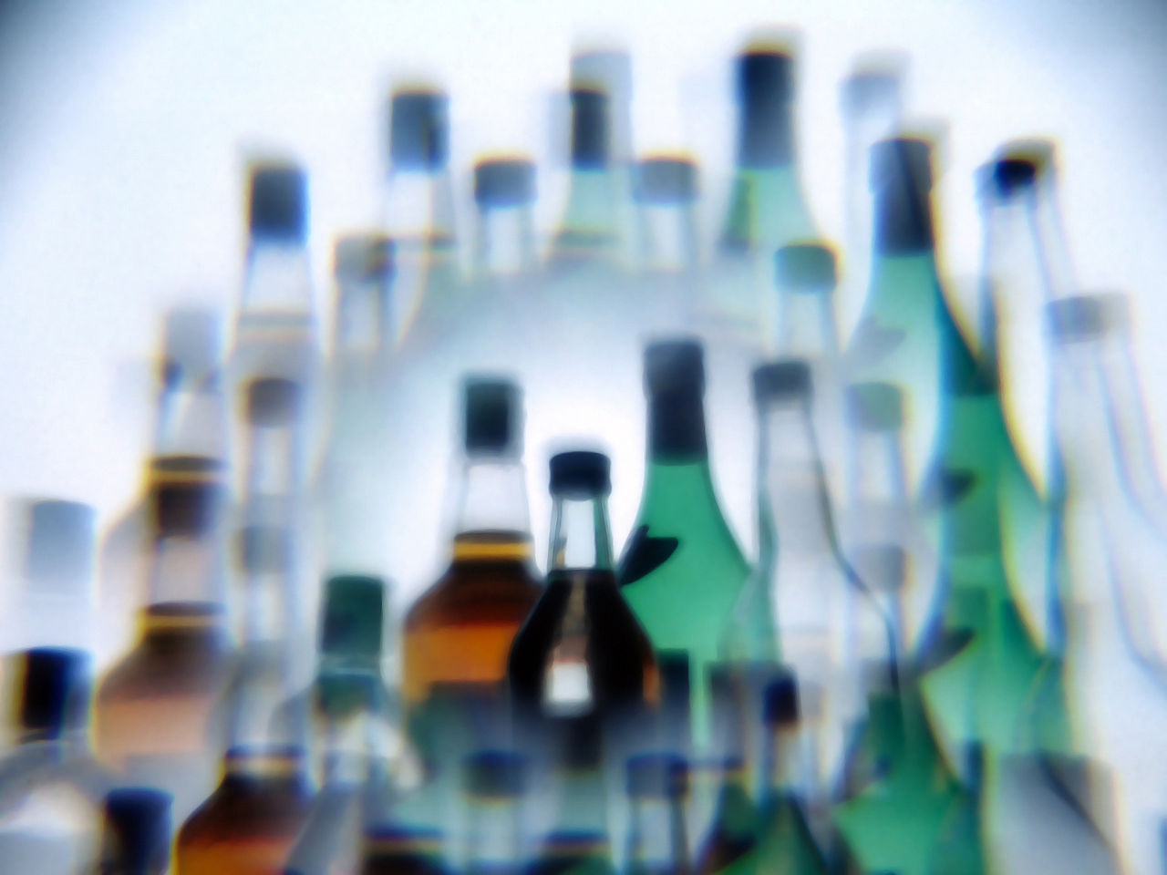 1280px-Alcohol_bottles_photographed_while_drunk